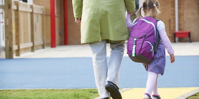 back to school, parents and kids walking to school