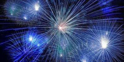 photo of bright blue fireworks