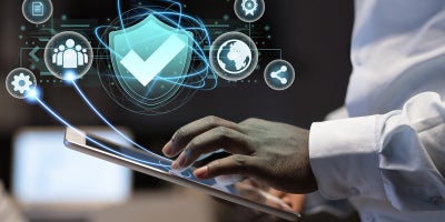 buckeye blog, small business cybersecurity, man using tablet for security