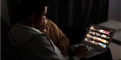 buckeye blog, affordable cable tv, cheap streaming services, couple watching streaming service on laptop