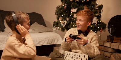 top tech gifts 2023, buckeye blog, two kids opening tech gifts