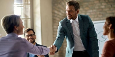 doing business with trusted companies, buckeye broadband values, people shaking hands