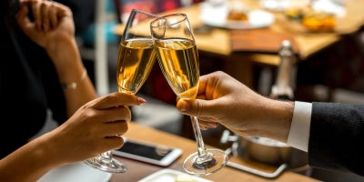 restaurants for valentines, romantic restaurant, clinking glasses together