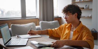 Fiber internet for education, fiber internet, college student doing homework