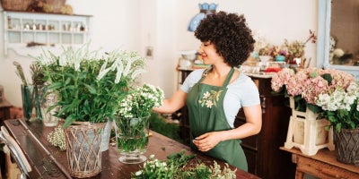 small business internet, smb internet, fiber internet, young flower shop owner image