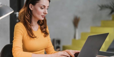 clear internet cache, clear cache, how to clear cache, woman on laptop