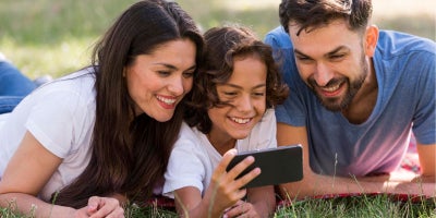 common apps that eat up data, family on phone outside