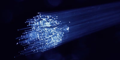 The hair-thin glass interior of a fiber-optic cable used for fiber internet