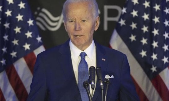 Former President Joe Biden speaks at a conference in Chicago, April 15.