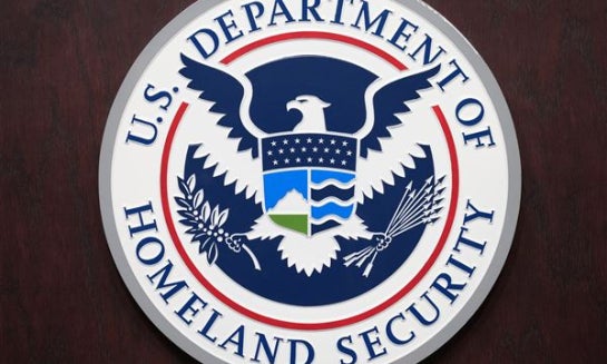 U.S. Department of Homeland Security sign, is seen during a news conference at ICE Headquarters on Oct. 9 in Washington.