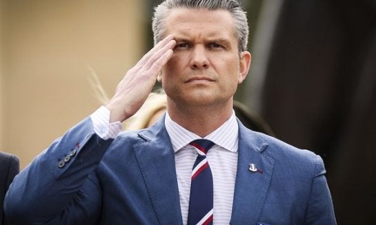 U.S. Defense Secretary Pete Hegseth salutes during a ceremony at the US cemetery to commemorate the 81st anniversary of the D-Day landings on June 6 in Colleville-sur-Mer, Normandy.