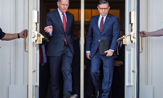 Sen. John Barrasso, R-Wyo., the Senate GOP whip, left, and Speaker of the House Mike Johnson, R-La., arrive for a news conference with top Republicans on the government shutdown, at the Capitol in Washington on Oct. 1.