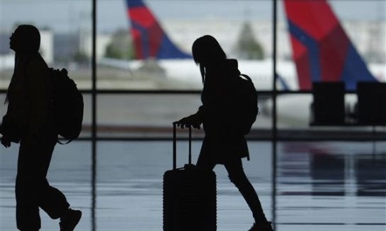 Travelers walk through Salt Lake City International Airport on May 24, 2024, in Salt Lake City ahead of Memorial Day.