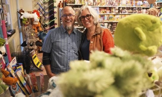 Co-owners Dean Smith, left, and Joanne Farrugia pose for a photograph in JaZams, one of their toy stores on June 2, in Princeton, N.J.