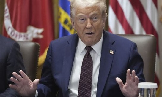 President Donald Trump speaks during a cabinet meeting, Aug. 26, at the White House in Washington.
