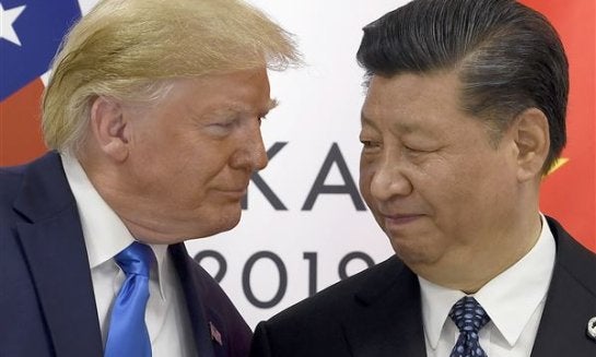 U.S. President Donald Trump, left, meets with Chinese President Xi Jinping on the sidelines of the G-20 summit on June 29, 2019, in Osaka, Japan.