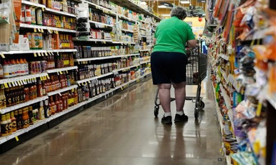A person shops for condiments at a grocery store Oct. 31 in Nashville, Tenn.