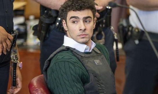 Luigi Mangione, accused of fatally shooting the UnitedHealthcare CEO Brian Thompson in New York City and leading authorities on a five-day search, appears in court for a hearing on Feb. 21 in New York.