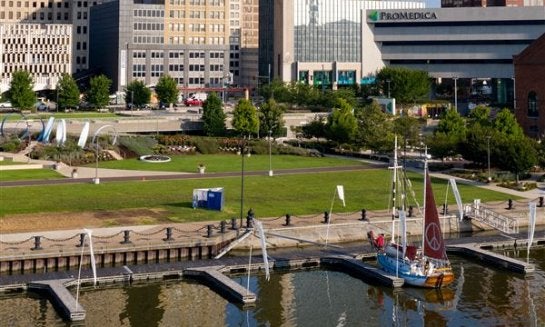 Viewed from a drone, Promenade Park meets the Maumee River, Aug. 11, 2023, in Toledo.