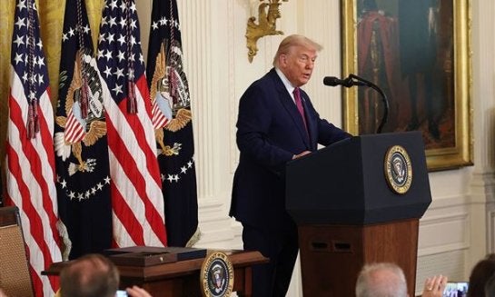 President Donald Trump delivers remarks before signing a series of bills related to California’s vehicle emissions standards during an event in the East Room of the White House on June 12 in Washington.