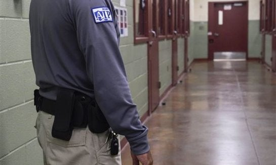 A security guard next to the group holding cells during a media tour of the Port Isabel Detention Center (PIDC), hosted by U.S. Immigration and Customs Enforcement (ICE) and Harlingen Enforcement and Removal Operations (ERO) in Los Fresnos, Texas, June 10
