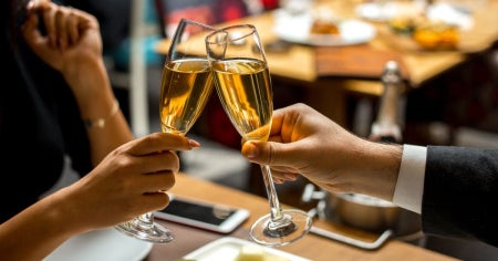 restaurants for valentines, romantic restaurant, clinking glasses together