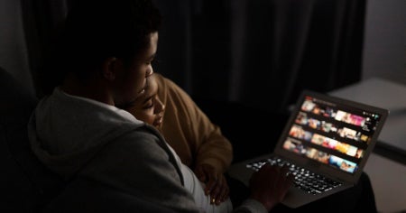 choosing a streaming service, streaming tv, couple watching streaming service