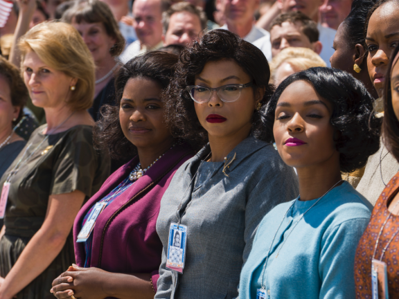 movie still of cast of hidden figures - octavia spencer, taraji henson, and janelle monae