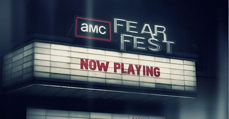 movie marquee with amc fear fest and now playing displayed
