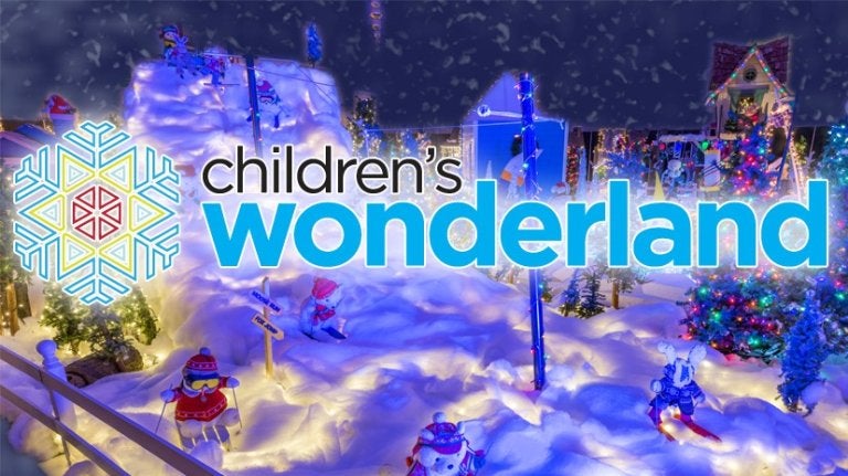 festive photo of christmas decorations with children's wonderland in text