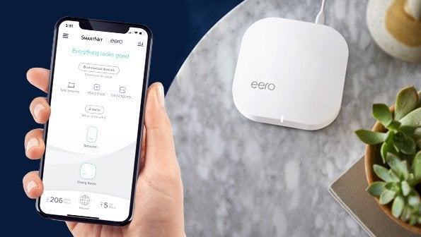 phone with eero app interface and eero router