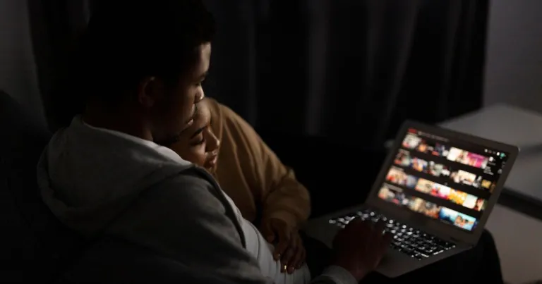choosing a streaming service, streaming tv, couple watching streaming service