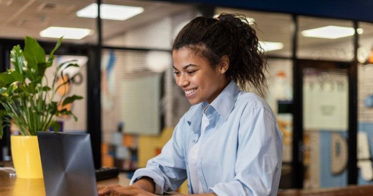 business internet, internet security tips, business internet support, woman at work on laptop